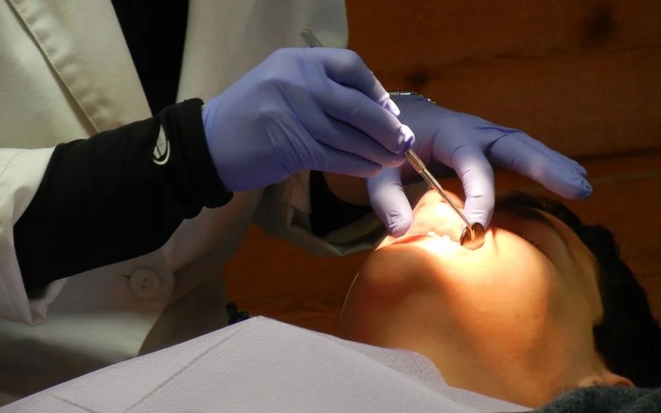 a dentist doing a cosmetic procedure